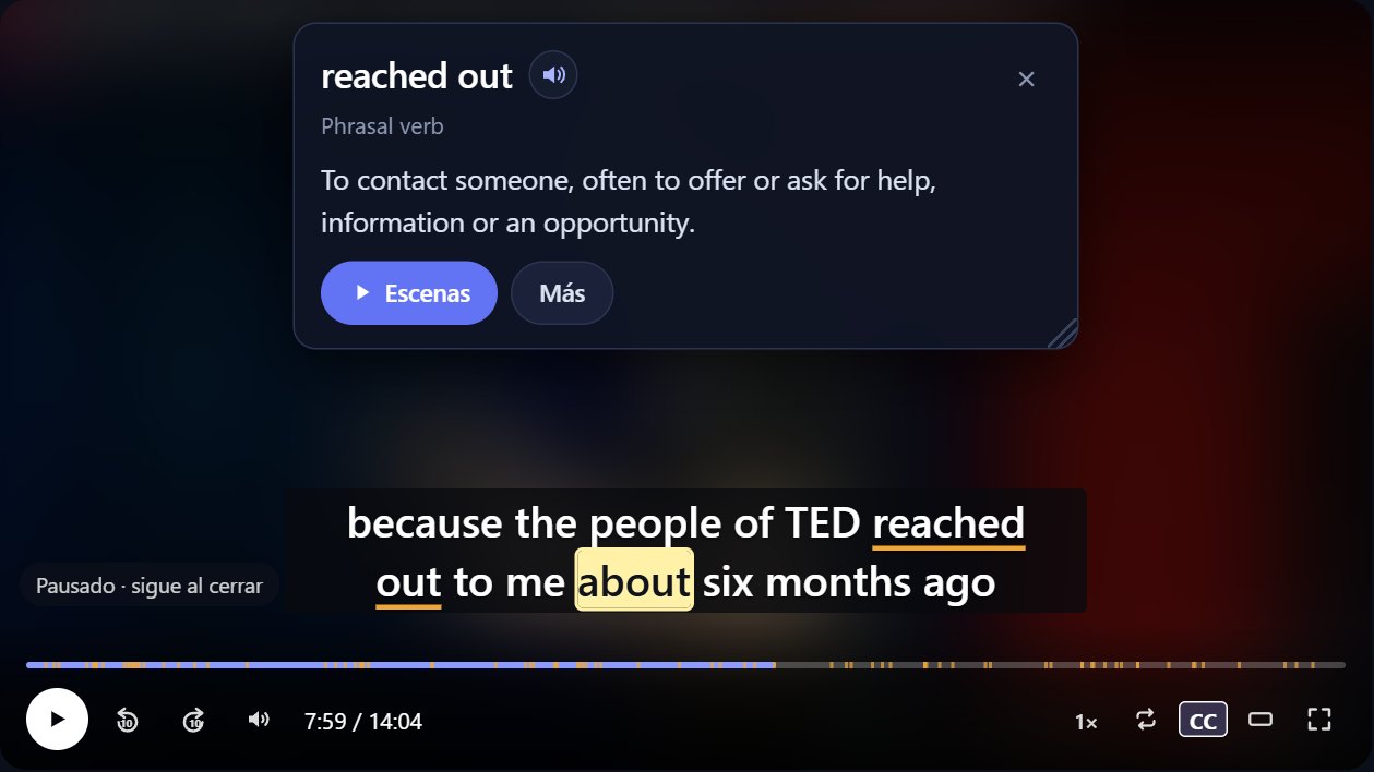 El reproductor: subtítulo con la palabra que suena resaltada y, encima del video, la explicación de 'reached out' (phrasal verb): to contact someone, often to offer or ask for help.